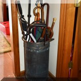 D58. Metal umbrella stand.